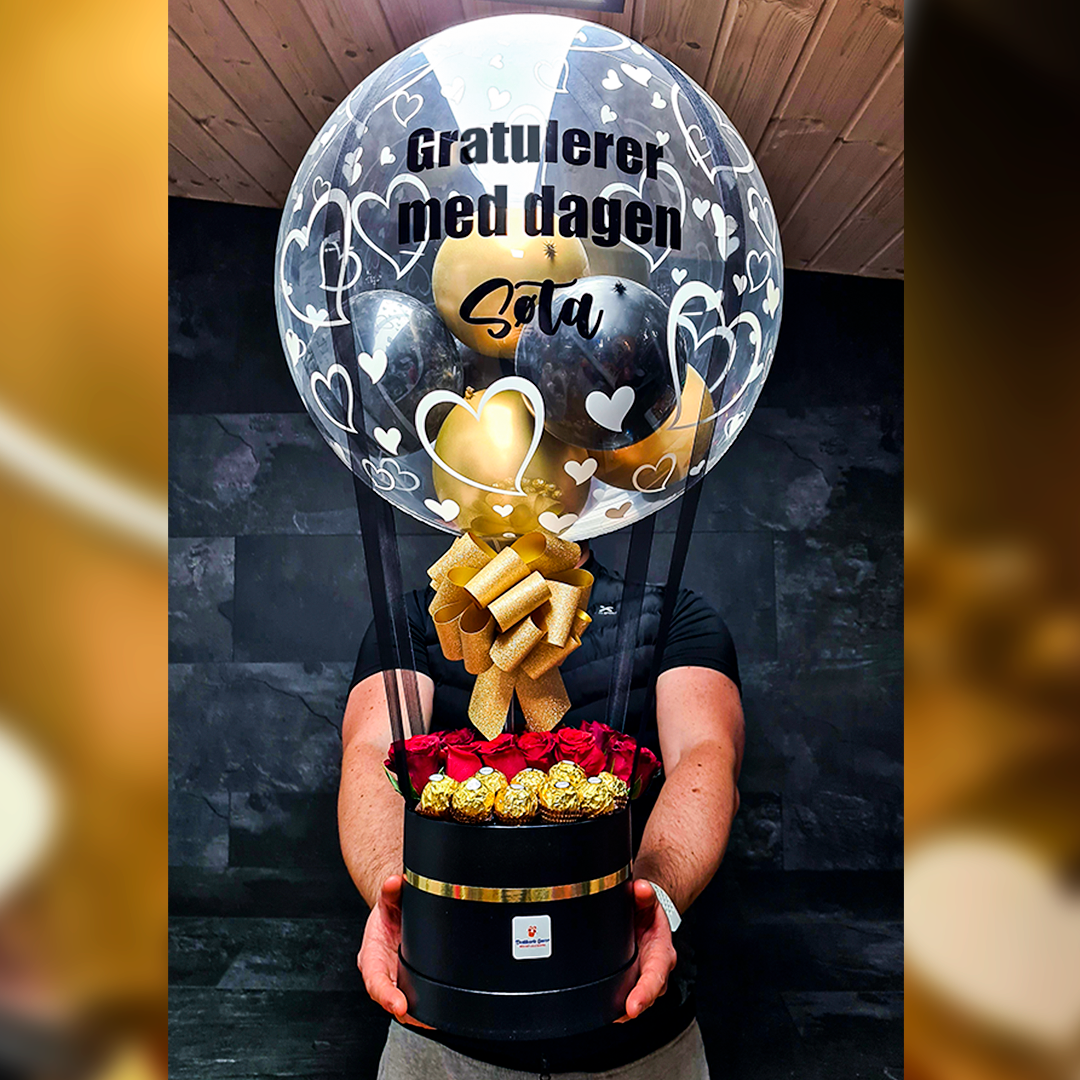 Hot air balloon med eske, tekst, roser og sjokolade